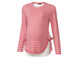 Těhotenská halenka s dlouhými rukávy v růžové barvě s bílými pruhy.