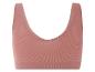 Růžová, žebrovaná sportovní podprsenka.