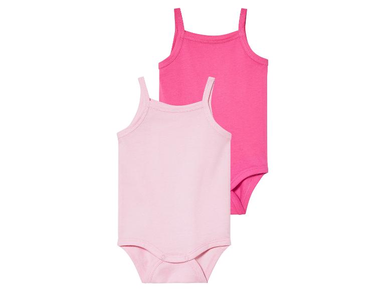 Dvě dětské body, růžová a fuchsiová.