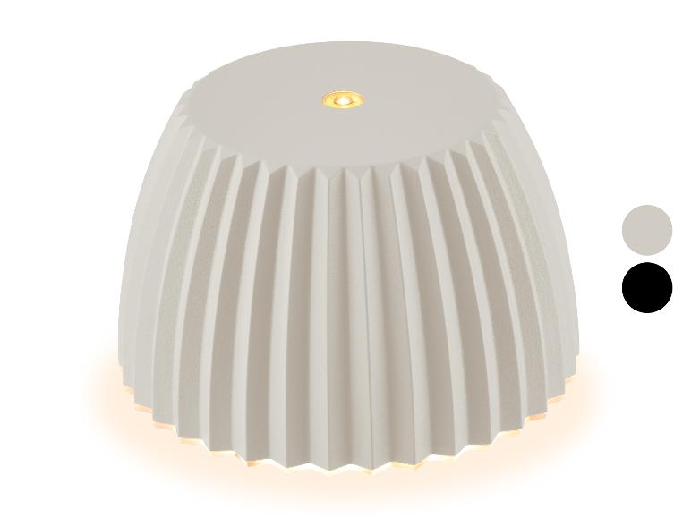 Bílá stolní lampa s plisovaným stínidlem a dvěma barevnými variantami.