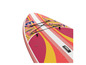 Růžový nafukovací paddleboard s tropickým vzorem.