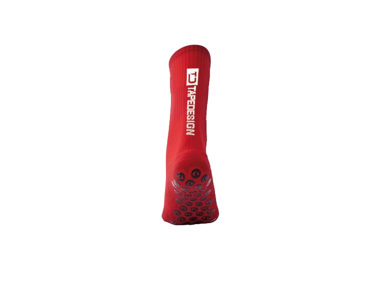 Červená sportovní ponožka Tapedesign s protiskluzovými body.