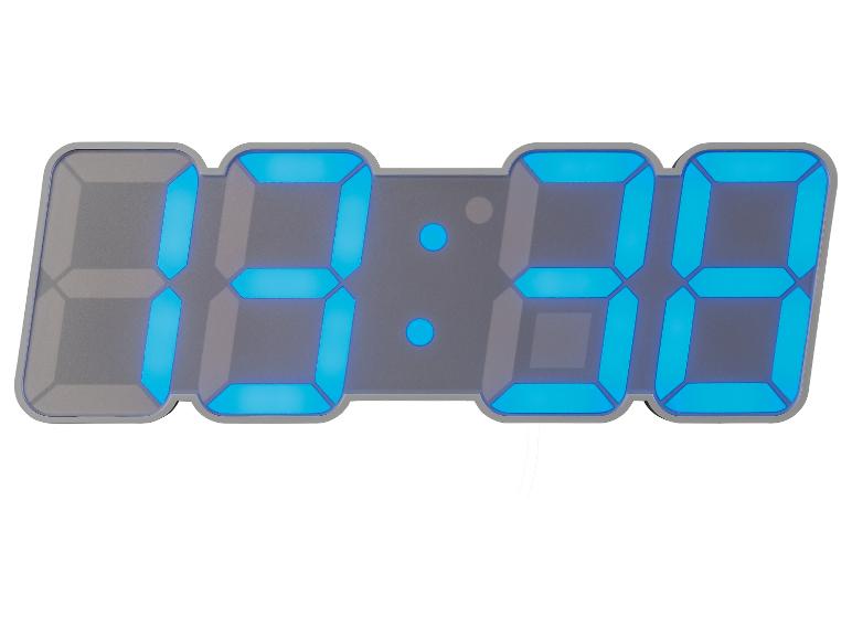 Digitální LED hodiny, moderní design, modrý displej.