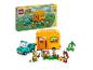 Sada LEGO Animal Crossing Leif's Caravan & Garden Shop s autem a figurkami.