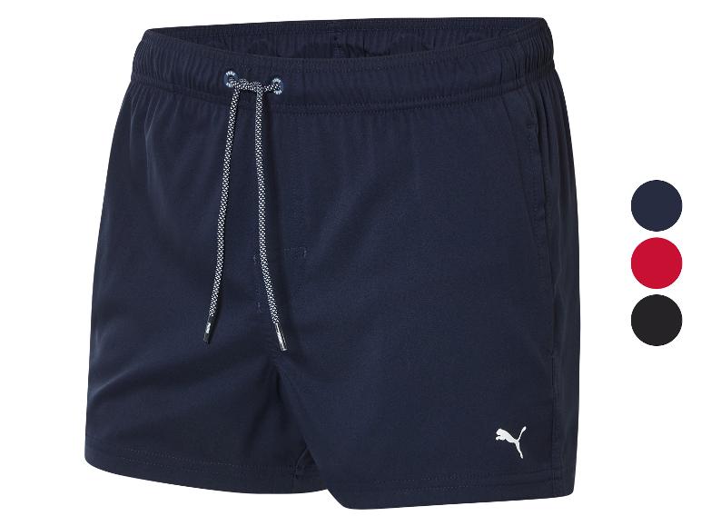 Plavky Puma: tmavě modré, červené a černé.
