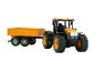 Radiově řízený traktor Fastrac se žlutým přívěsem.