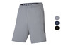 Šedé sportovní šortky Under Armour s černými detaily.