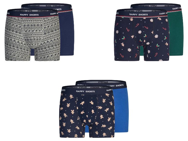 Tři balení po dvou pánských boxerkách s vánočními motivy.