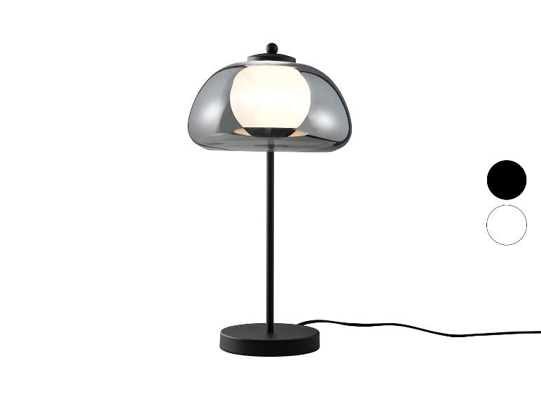Stolní lampa s kouřovým skleněným stínítkem a černou základnou, s barevnými možnostmi.