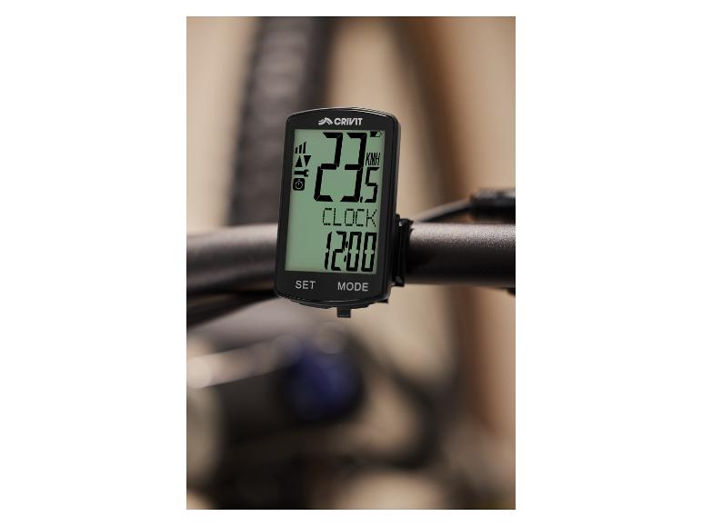 Cyklistický počítač Crivit s rychlostí 23,5 km/h.
