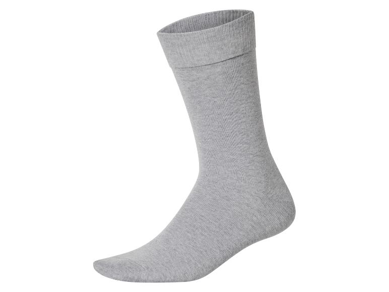 Šedá bavlněná ponožka, boční pohled, na bílém pozadí.