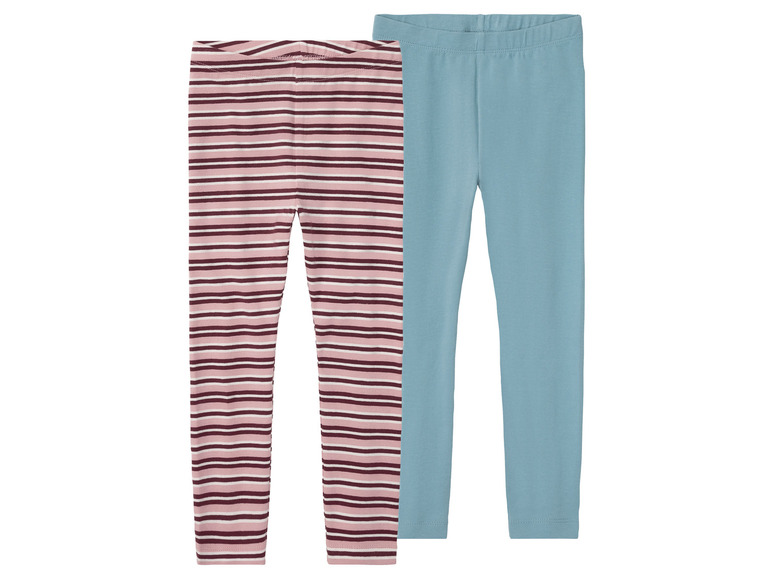 Dvě legíny pro dívky: jedna s růžovo-fialovými pruhy a jedna hladká světle modrá.