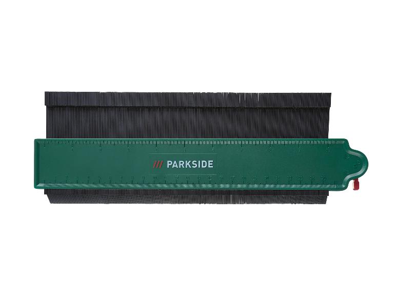 Zelené Parkside pravítko s černým měřicím pásem.