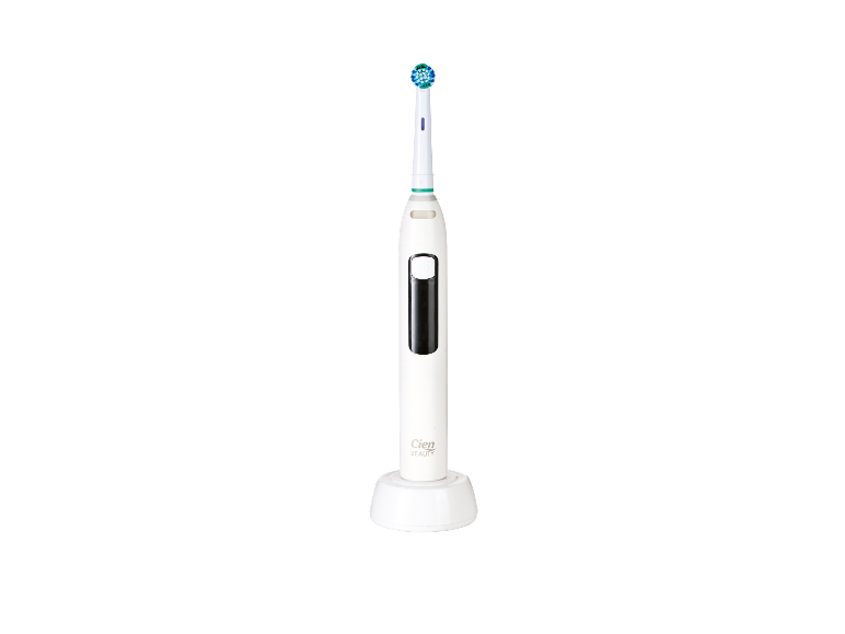 Bílý elektrický zubní kartáček Cien Beauty na své nabíjecí základně.