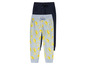 Dvě teplákové kalhoty, jedna s citronovým vzorem