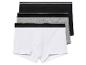 Tři balení boxerů v bílé, šedé a černé barvě