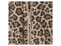 Detail béžové bundy s leopardem a zipem.
