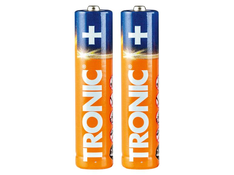 Dvě oranžové a modré baterie Tronic se symboly plus.