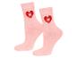 Dvě růžové ponožky s červeným srdcem s puzzle kouskem.
