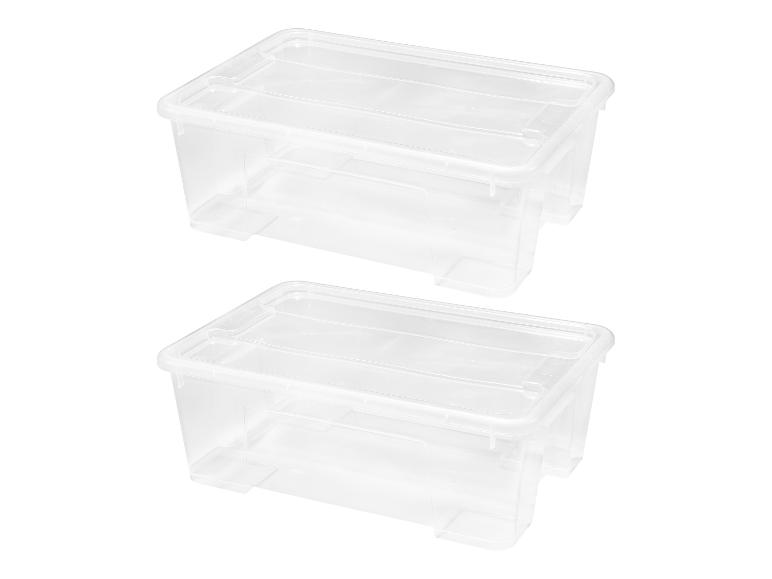 Dva průhledné plastové úložné boxy s víky.