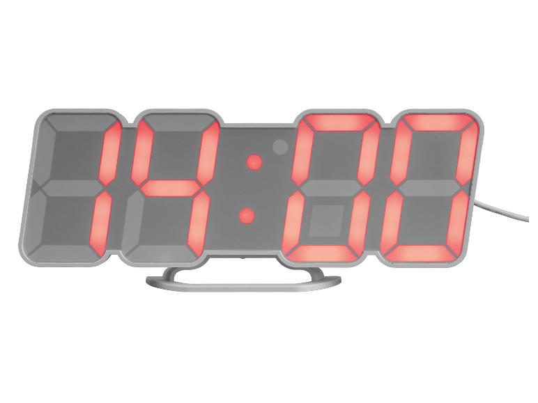 Digitální hodiny s červeným LED displejem ukazující čas 04:00.