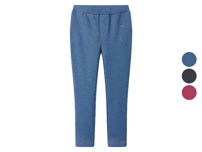Modré jeggings s falešnými kapsami a barevnou paletou modré, černé a bordó.