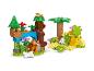 Barevná stavebnice LEGO Duplo džungle s tygrem, želvami, stromy a kostí.