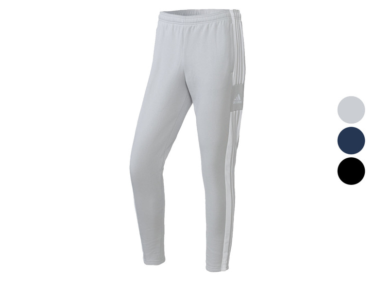 Šedé tepláky s bílými pruhy od Adidas