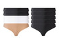 Sada černých, bílých a béžových tangových kalhotek.