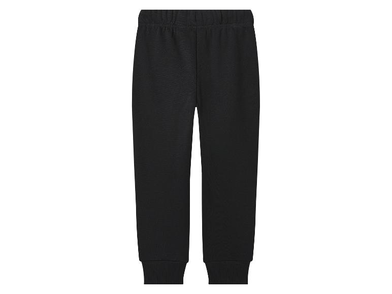 Černé dětské tepláky s elastickým pasem a manžetami.