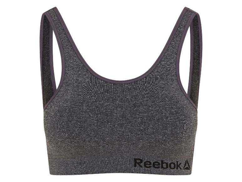 Šedá sportovní podprsenka s logem značky Reebok.