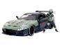 Modré auto Mazda RX-7 s figurkou Naruto.