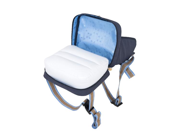 Otevřená modrá taška s bílým nafukovacím polštářem uvnitř.