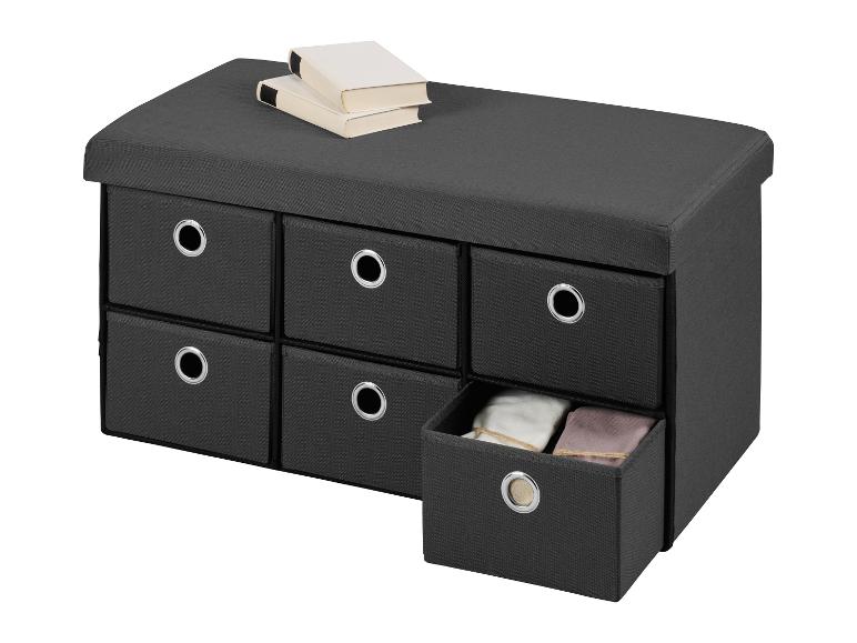 Tmavě šedá úložná lavice se šesti zásuvkami a knihami nahoře