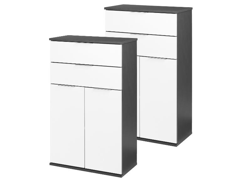 Dvě moderní dvoubarevné skříňky na uložení v bílé a šedé barvě.