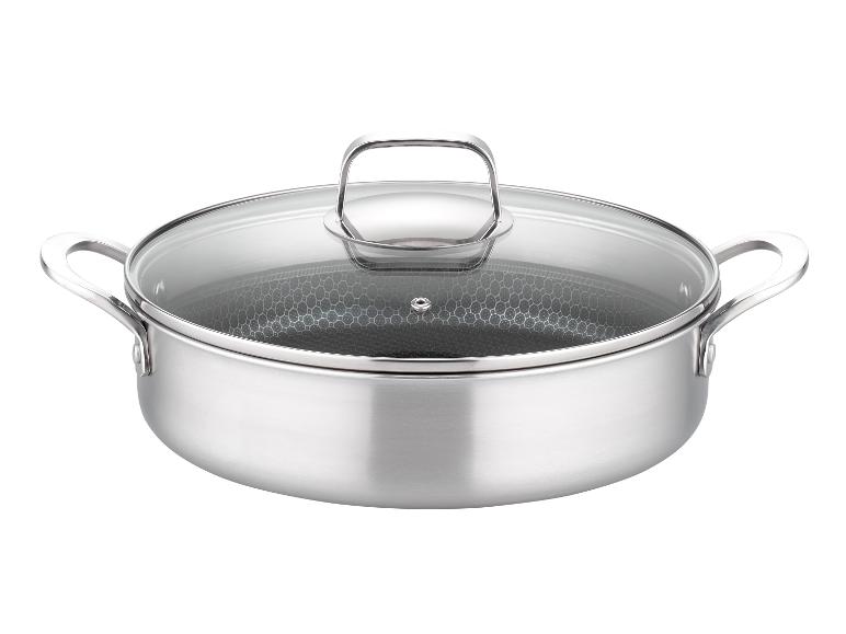 Nerezový hrnec s průhledným víkem.