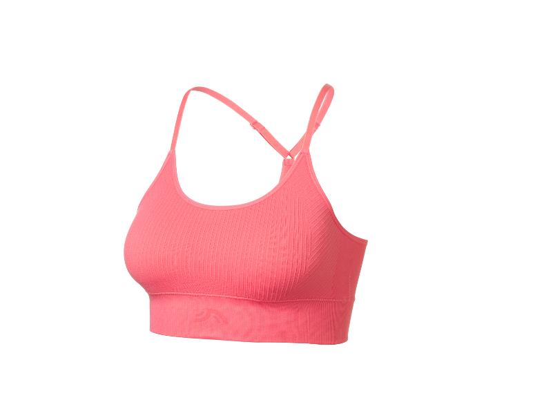 Růžová žebrovaná sportovní podprsenka s tenkými ramínky.