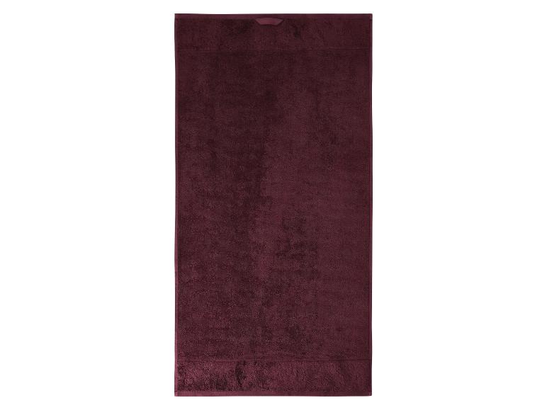Bordó koupací osuška.