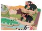 Dřevěné puzzle s africkými zvířaty jako slon, krokodýl, zebra a šimpanzi.