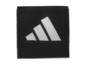 Černé logo Adidas na černém pozadí.