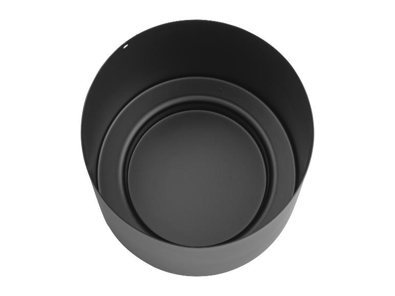 Kulatý černý kovový květináč s jednoduchým, moderním designem.