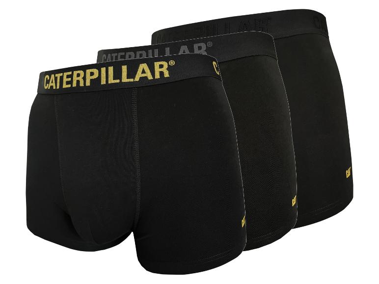 Tři černé pánské boxerky se žlutým nápisem na gumičce.