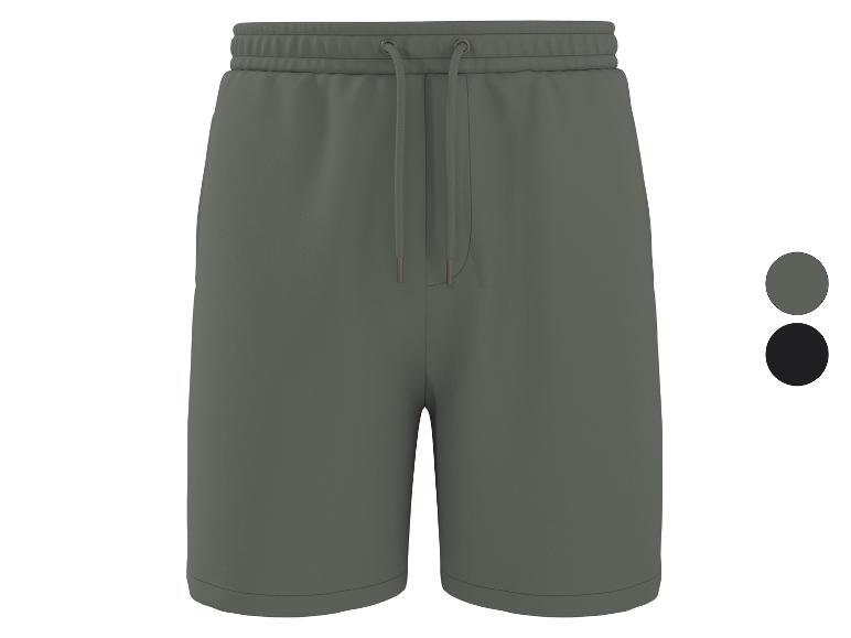 Pánské tmavě zelené teplákové kraťasy se stahovací šňůrkou, dostupné ve dvou barvách.