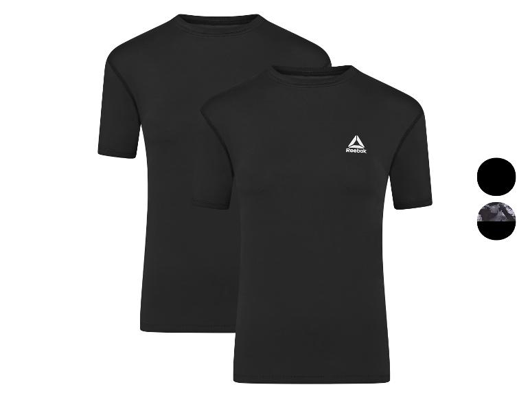 Dvě černá Reebok trička s krátkým rukávem.