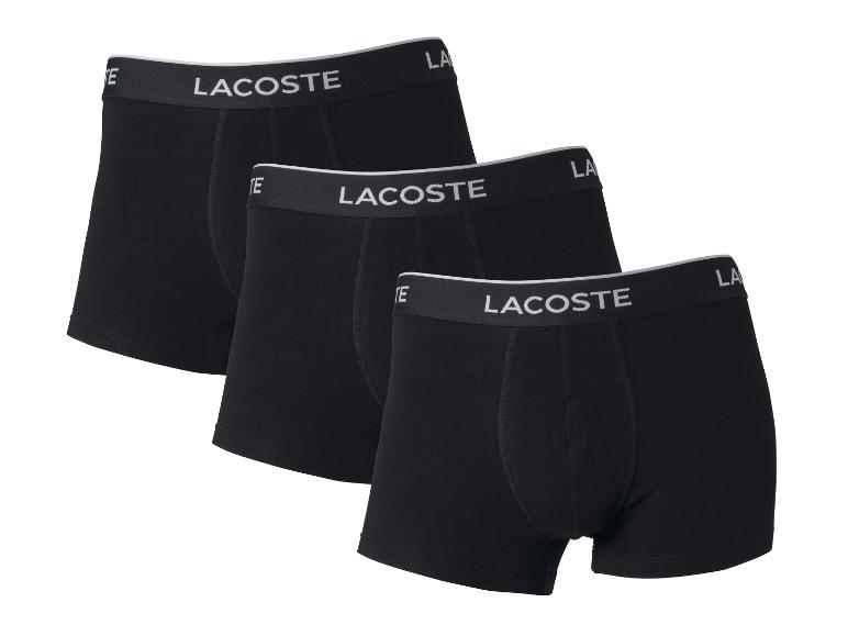 Tři černé boxery Lacoste.