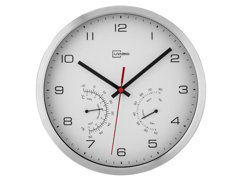 Nástěnné hodiny Livarno s teploměrem a vlhkoměrem, ukazující 10:10.