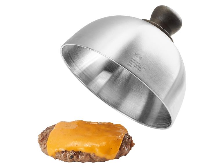 Kovový poklop na tavení sýra na burgeru s nápisem „GRILL MEISTER“