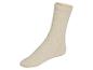 Pár krémových ponožek s měkkým lemem.