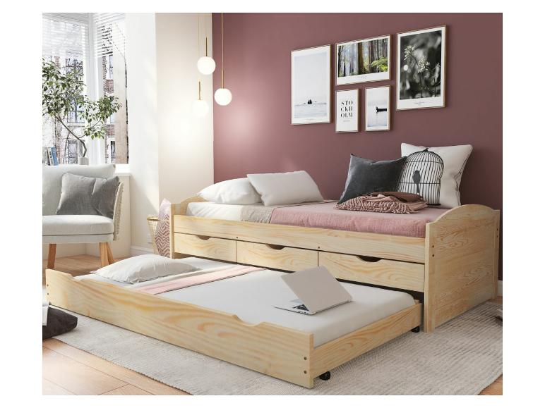 Dřevěná rozkládací pohovka s vysunovacím lůžkem a zásuvkami na uložení.