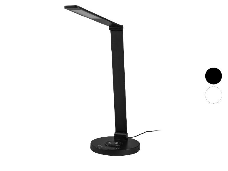Černá LED stolní lampa s bezdrátovou nabíječkou a dotykovým panelem.